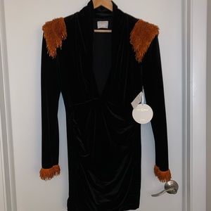 Miss Circle XL plunge velvet dress with reddish orange beads at shoulders/wrist.